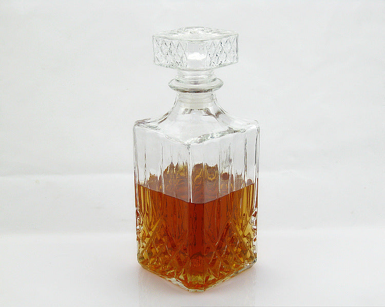 Whisky decanters in various cut glass designs