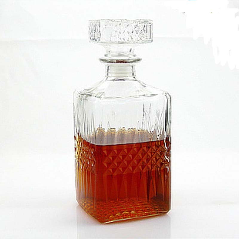 Whisky decanters in various cut glass designs