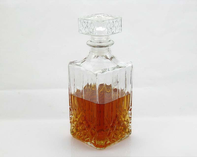 Whisky decanters in various cut glass designs